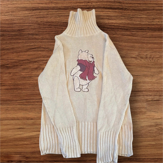 Disneyland resort, Paris original label turtleneck jumper with embroidered Winnie the Pooh emblem on the front size large in good condition