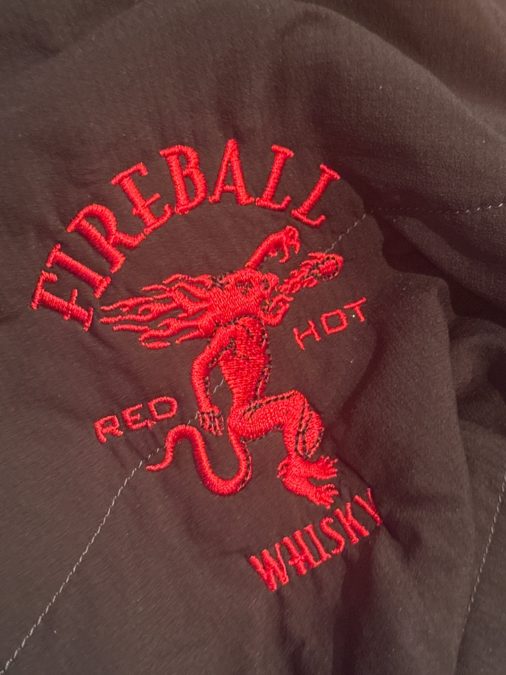 Patagonia Women's Small Black Jacket with Fireball Whisky Em